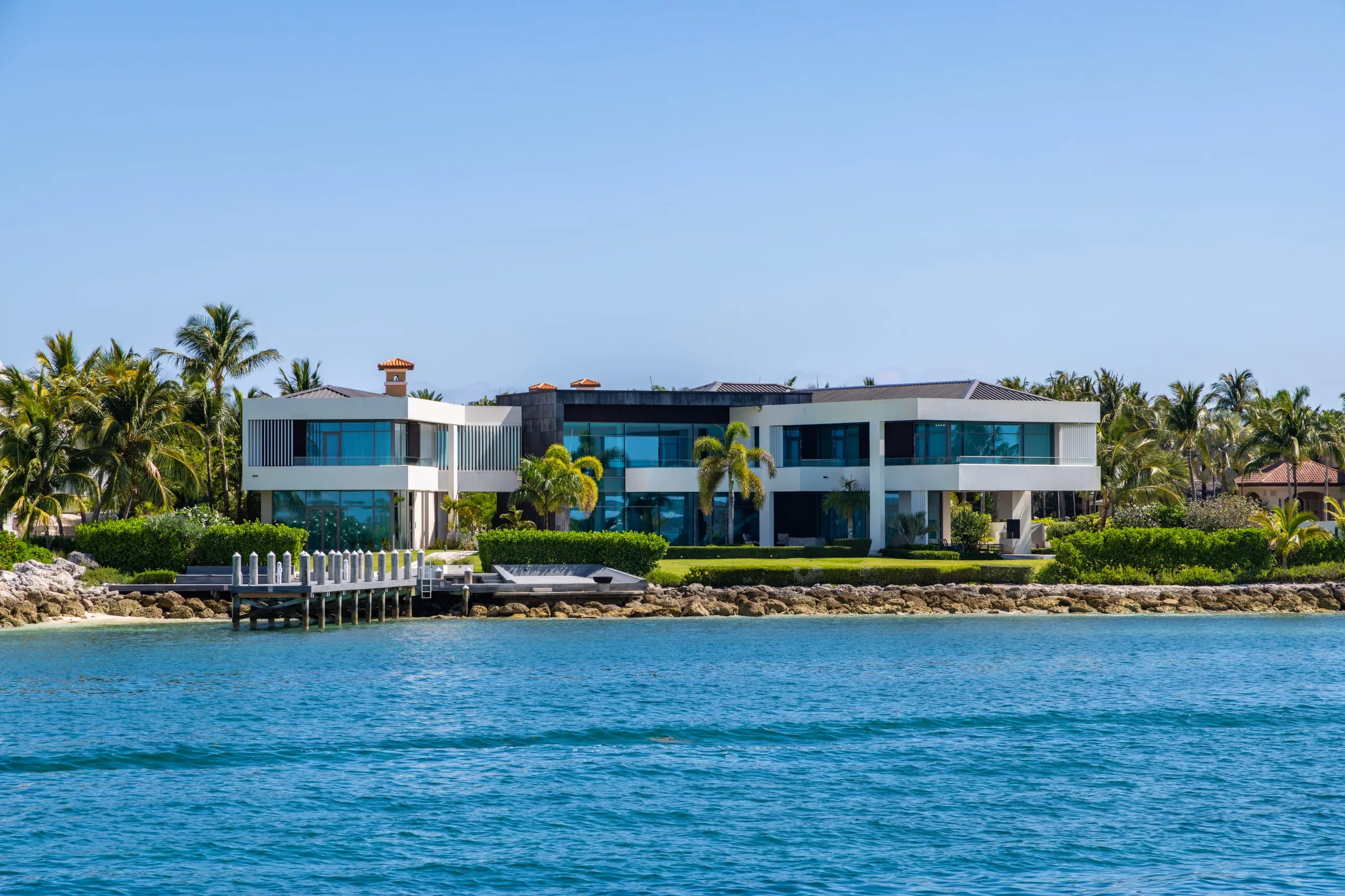 Modern waterfront home photographed from the water in Palm Beach County