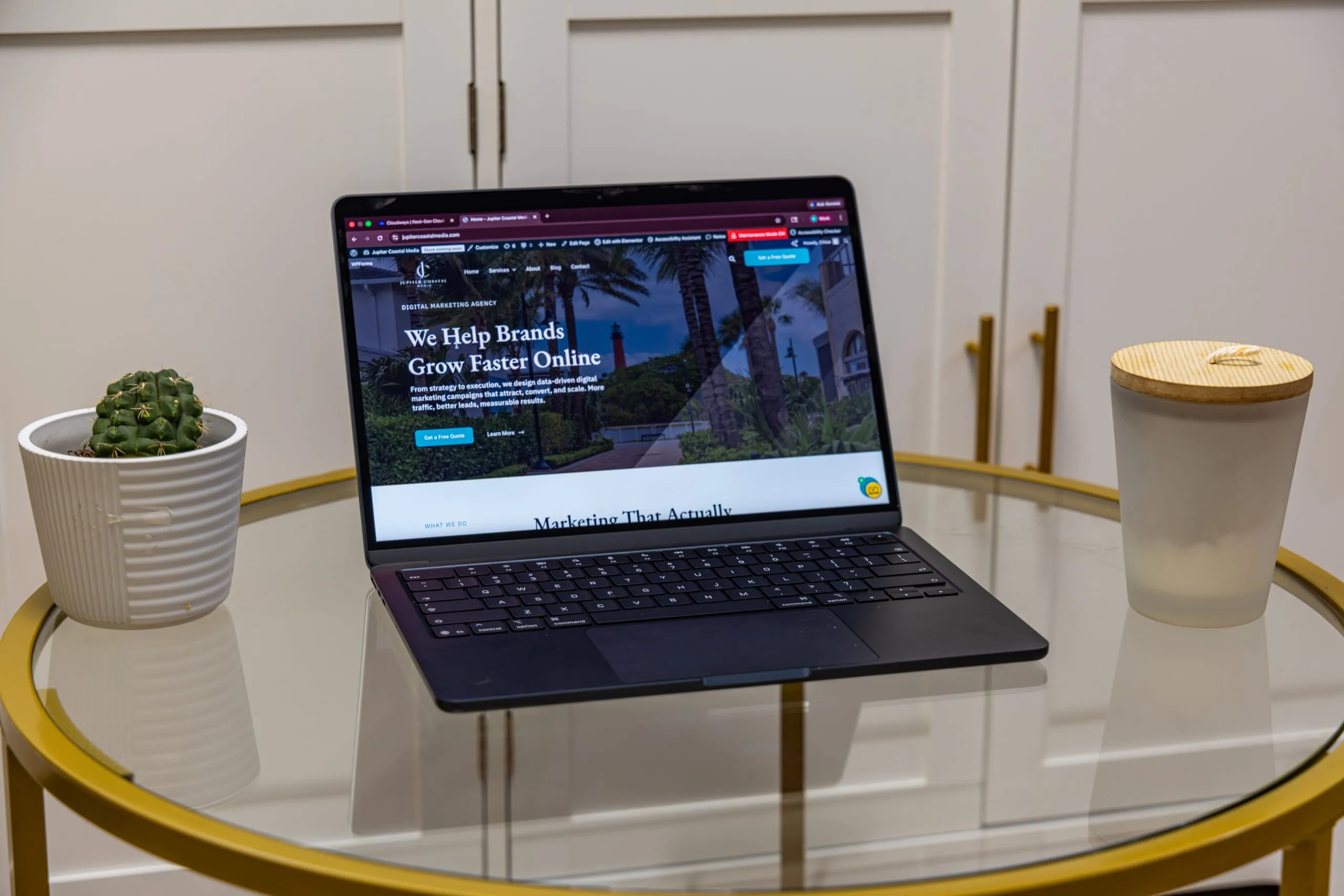 A modern, custom local business website displayed on a laptop